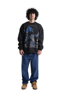 Person wearing a black Detroit Lions sweatshirt on a white background